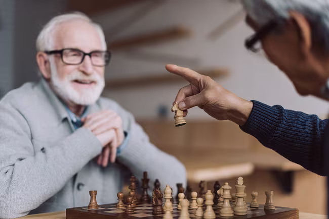 men-playing-chess-in-bar